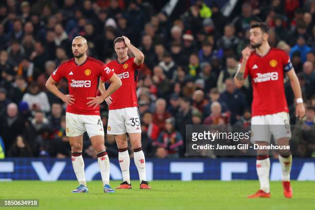 Jonny Evans of Manchester United looks dejected after they concede the opening goal during the UEFA Champions League match between Manchester United...
