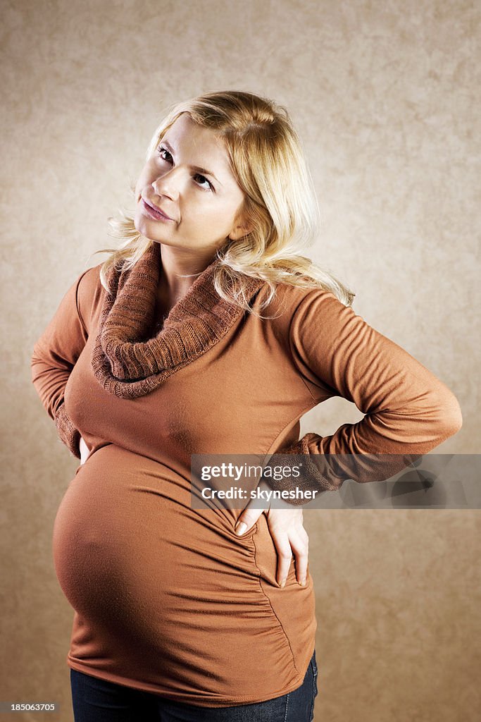 Femme enceinte ayant Mal de dos.