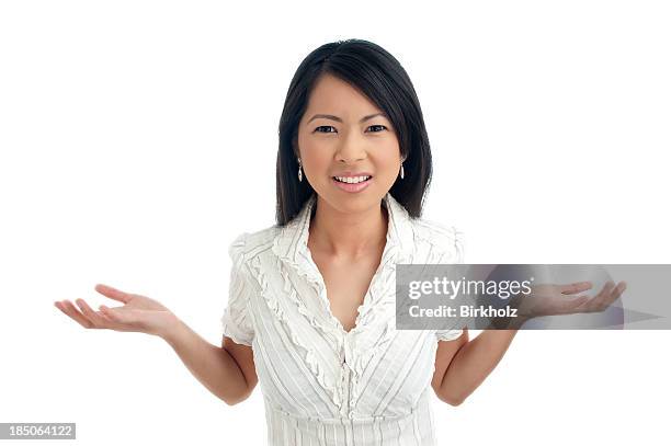 young asian woman wondering - raised eyebrows stock pictures, royalty-free photos & images