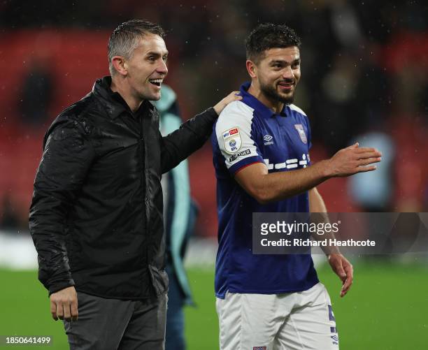 Kieran McKenna and Sam Morsy of Ipswich Town celebrate with the fans after the team's victory during the Sky Bet Championship match between Watford...