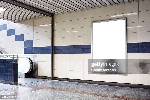 blank billboard in a subway station wall. - train station floor stock pictures, royalty-free photos & images