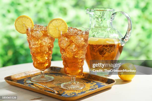 iced tea with pitcher - ice tea stock pictures, royalty-free photos & images