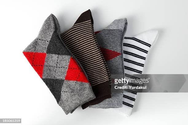arrangement of folded socks - striped socks stock pictures, royalty-free photos & images