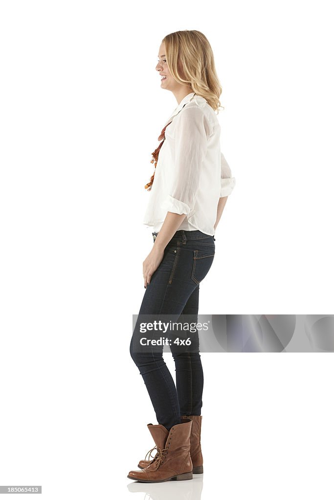 Profile of a happy woman standing