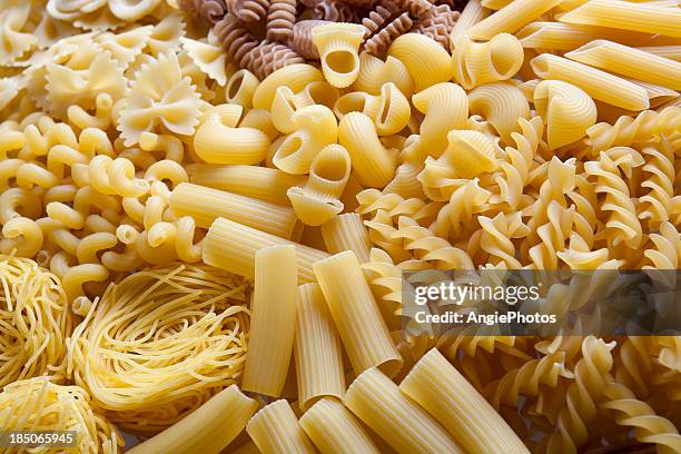pasta variation - koolhydraat voedsel stockfoto's en -beelden