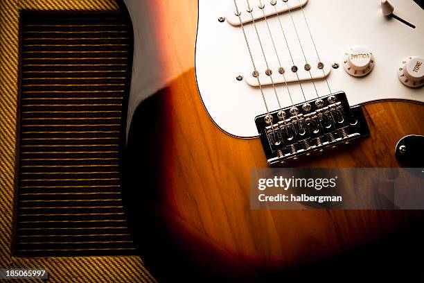 classic electric guitar and amp - amplifier abstract stock pictures, royalty-free photos & images