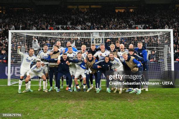 The players of FC Copenhagen celebrate as they pose for a team photo at full-time following the UEFA Champions League match between F.C. Copenhagen...