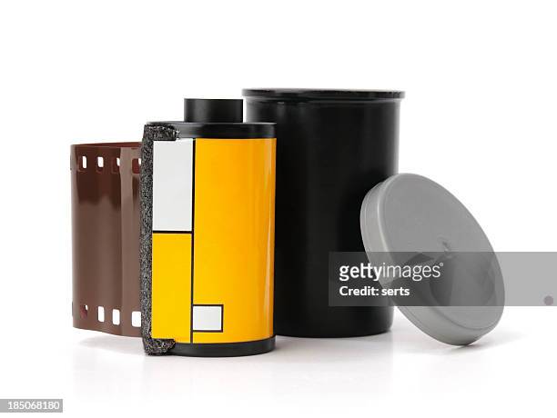 old school film canister isolated on white background - canister stock pictures, royalty-free photos & images