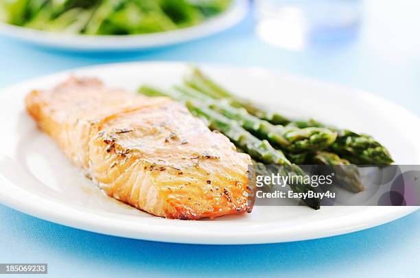 baked salmon and asparagus - white plate stock pictures, royalty-free photos & images