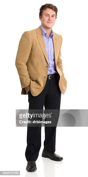 cheerful young man standing alone - gold blazer stock pictures, royalty-free photos & images