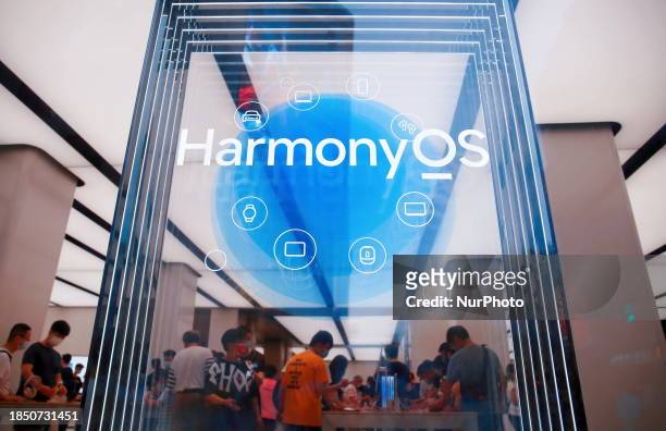 The HarmonyOS logo is being displayed at the flagship store of Huawei Smart Home in Shanghai, China, on June 14, 2021.