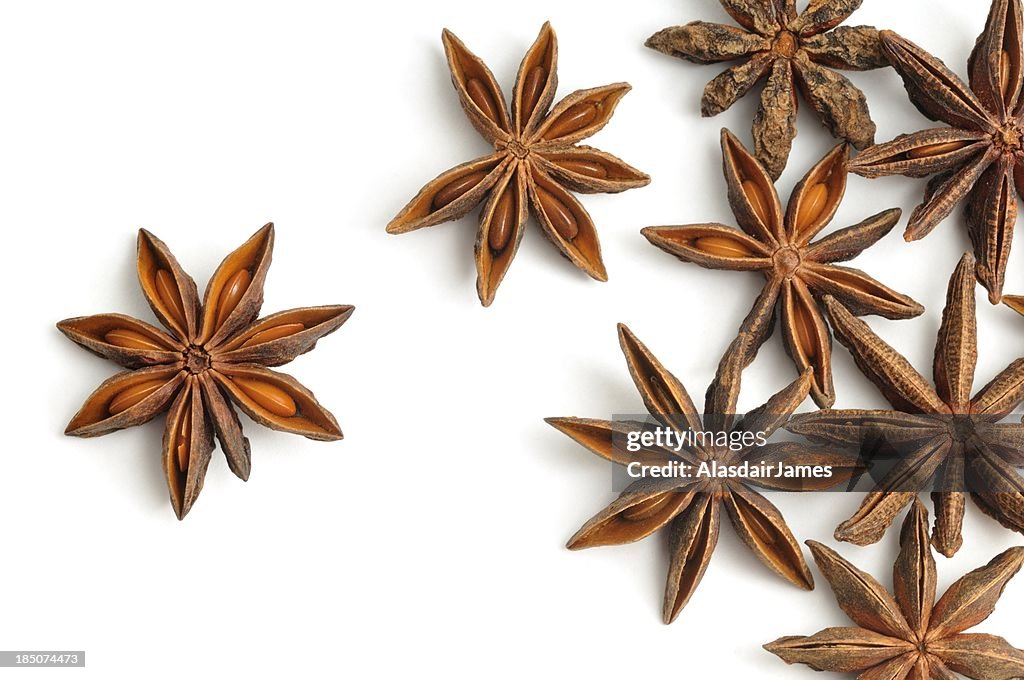 Star anise pods scattered