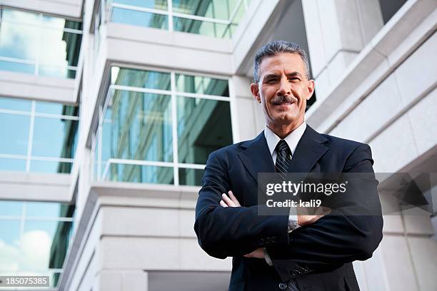 Man In Building Business Man Standing In Front Of Building Photos and Premium High Res ...