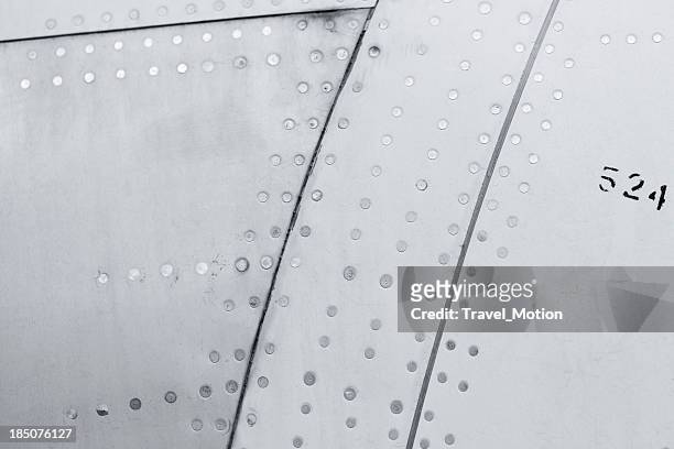 close-up of a aircraft background texture - aeroplane close up stock pictures, royalty-free photos & images