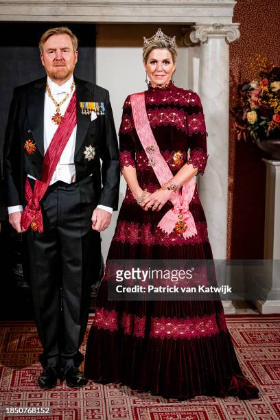 King Willem-Alexander of The Netherlands and Queen Maxima of The Netherlands pose for an official picture at the start of the state banquet in the...