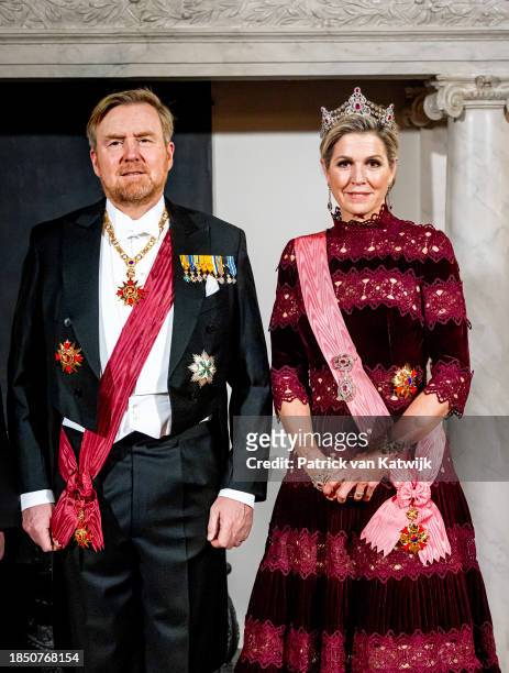 King Willem-Alexander of The Netherlands and Queen Maxima of The Netherlands pose for an official picture at the start of the state banquet in the...