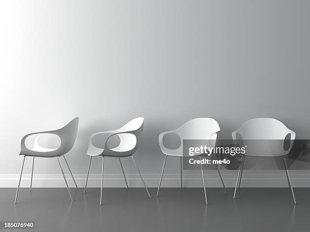 3d modern chair on white wall - plastic design furniture stockfoto's en -beelden