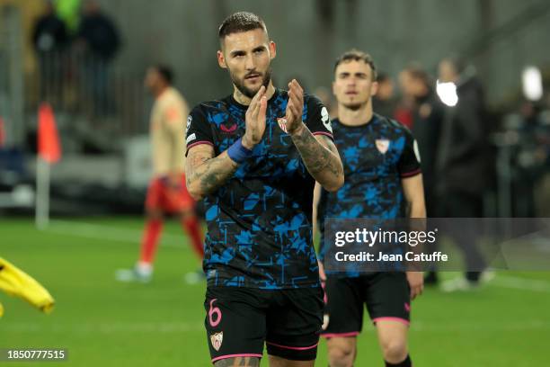 Nemanja Gudelj of Sevilla FC salutes the supporters following the UEFA Champions League match between RC Lens and Sevilla FC at Stade...
