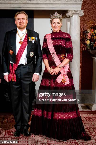 King Willem-Alexander of The Netherlands and Queen Maxima of The Netherlands pose for an official picture at the start of the state banquet in the...