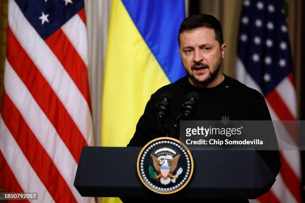Ukrainian President Volodymyr Zelensky speaks during a news conference with and U.S. President Joe Biden in the Indian Treaty Room of the Eisenhower...