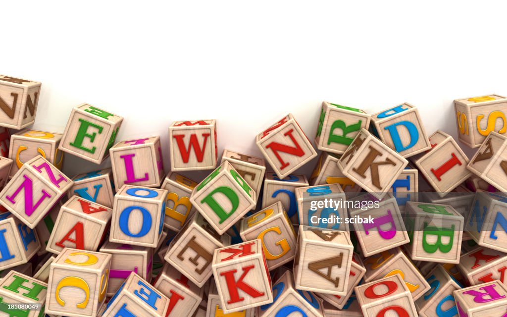 Alphabet blocks scattered at the bottom