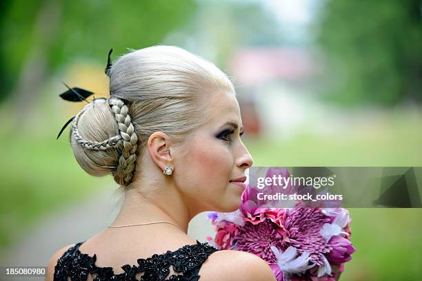woman with beautiful hairstyle - braided buns stock pictures, royalty-free photos & images