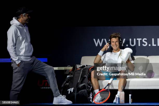 Diego Schwartzman of Argentina with his coach Mariano Zabaleta on Day One at ExCel London on December 15, 2023 in London, England.