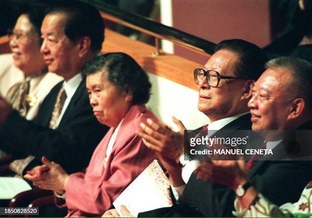 Chinese President Jiang Zemin and his wife Wang Yaping , Hong Kong Chief Executive Tung Chee Hwa, and Chinese Vice Premier Qian Qichen and his wife ,...