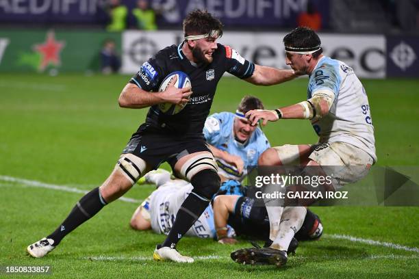 Glasgow Warriors' Scottish flanker Ally Miller runs with the ball during the European Champions Cup second round day 2 group C Rugby Union match...