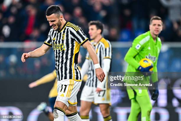 Filip Kostic , Andrea Cambiaso and Wojciech Szczesny of Juventus react with disappointment after Albert Gudmundsson of Genoa has scored a goal during...