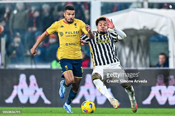 Junior Messias of Genoa and Weston McKennie of Juventus vie for the ball during the Serie A TIM match between Genoa CFC and Juventus at Stadio Luigi...