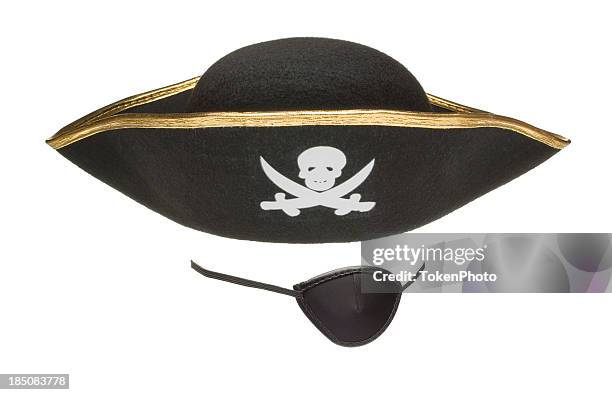 an eye patch and a pirates hat - pirate hat stock pictures, royalty-free photos & images