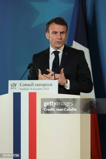 President of France Emmanuel Macron holds press conference following the European Council summit at Batiment Europa on December 15, 2023 in Brussels,...