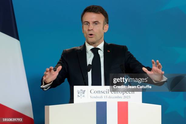 President of France Emmanuel Macron holds press conference following the European Council summit at Batiment Europa on December 15, 2023 in Brussels,...