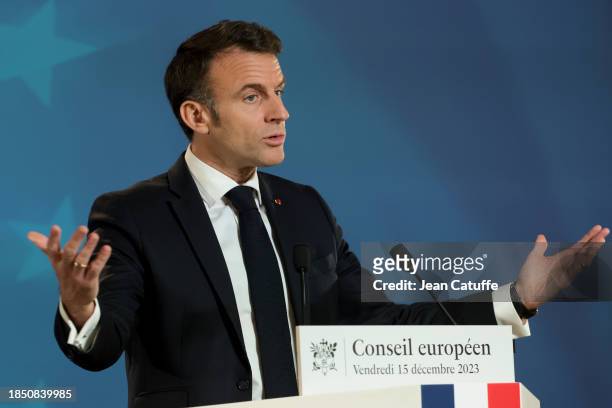 President of France Emmanuel Macron holds press conference following the European Council summit at Batiment Europa on December 15, 2023 in Brussels,...