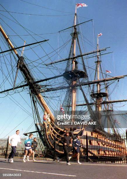 The HMS Victory, which was Admiral Horatio Nelson's flagship at the Battle of Trafalgar, provides a nautical backdrop for US President Bill Clinton...