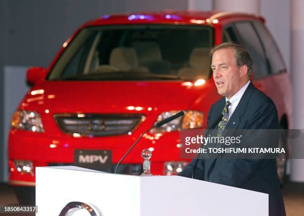 President of Mazda James Miller introduces the company's redesigned minivan, the new MPV , during its press preview at a hotel in Tokyo 24 June 1999....
