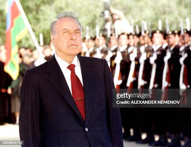 Azery President Heydar Aliyev stands still in a minute of silent at the memorial cemetery of the fighters who had died for the independence of...