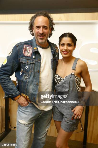James Curleigh, Executive Vice President and President, the Levi's Brand, and Freida Pinto seen at Levi's at Coachella on Saturday, April 16 in Indio.