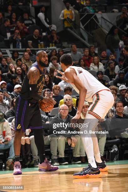 LeBron James of the Los Angeles Lakers handles the ball during the game against Victor Wembanyama of the San Antonio Spurs on December 15, 2023 at...