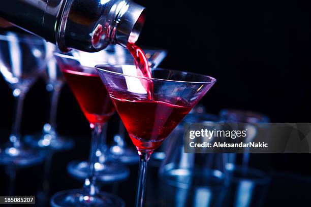 cocktail in a nightclub - cocktail shaker stock pictures, royalty-free photos & images