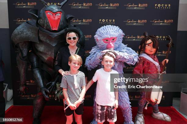 Kathleen Robertson and William Robert Cowles seen at Focus Features and LAIKA Grand Opening of "From Coraline to Kubo: A Magical LAIKA Experience" at...