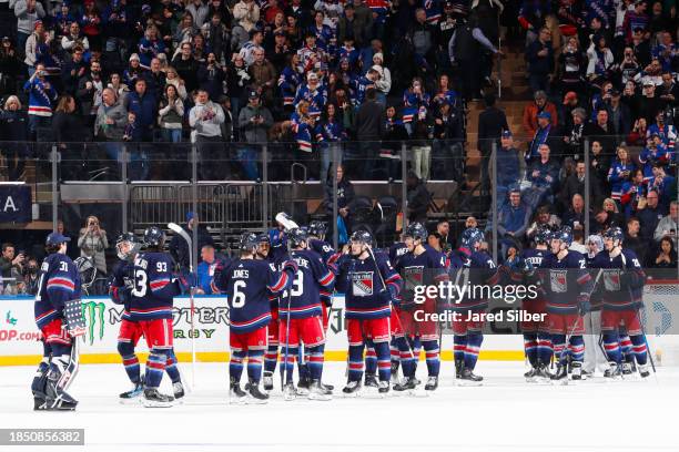 The New York Rangers celebrate a 5-1 win against the Anaheim Ducks at Madison Square Garden on December 15, 2023 in New York City.