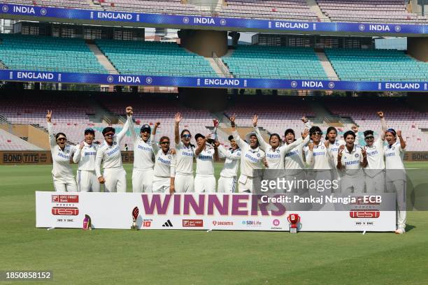 Players of India celebrate with series trophy after their team's win over England during day 3 of the Test match between India Women and England...