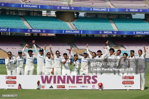 Players of India celebrate with series trophy after their team's win over England during day 3 of the Test match between India Women and England...