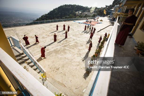 Novice Monks play cricket at Kirti Monastery on October 18, 2023 in Dharamsala, India. McLeodganj is a suburb of Dharamshala in Kangra district,...