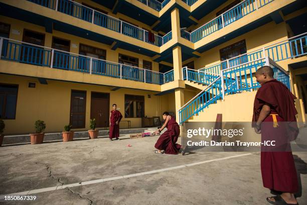 Novice Monks play cricket at Kirti Monastery on October 18, 2023 in Dharamsala, India. McLeodganj is a suburb of Dharamshala in Kangra district,...