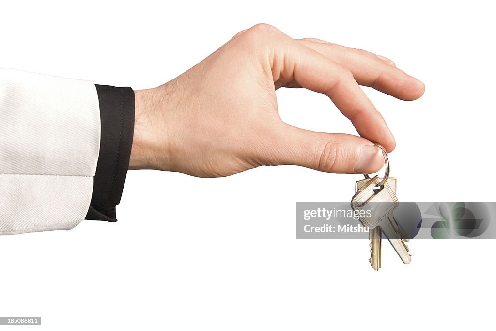 Hand giving keys