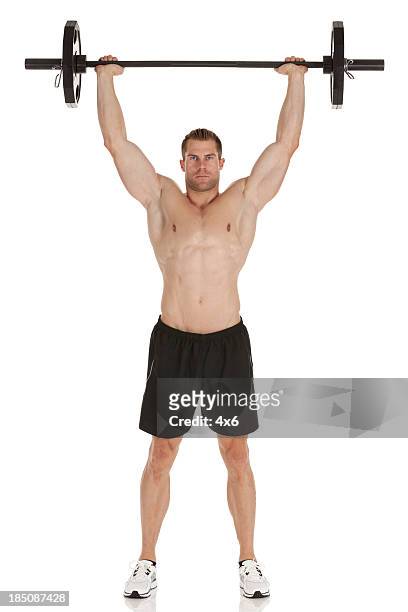 muskuläre mann gewichtheben - bodybuilder isolated stock-fotos und bilder