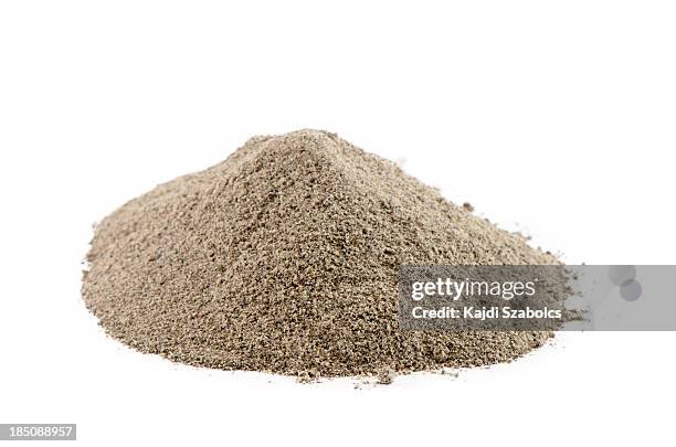 pile of ground black pepper isolated on white - black peppercorn stock pictures, royalty-free photos & images